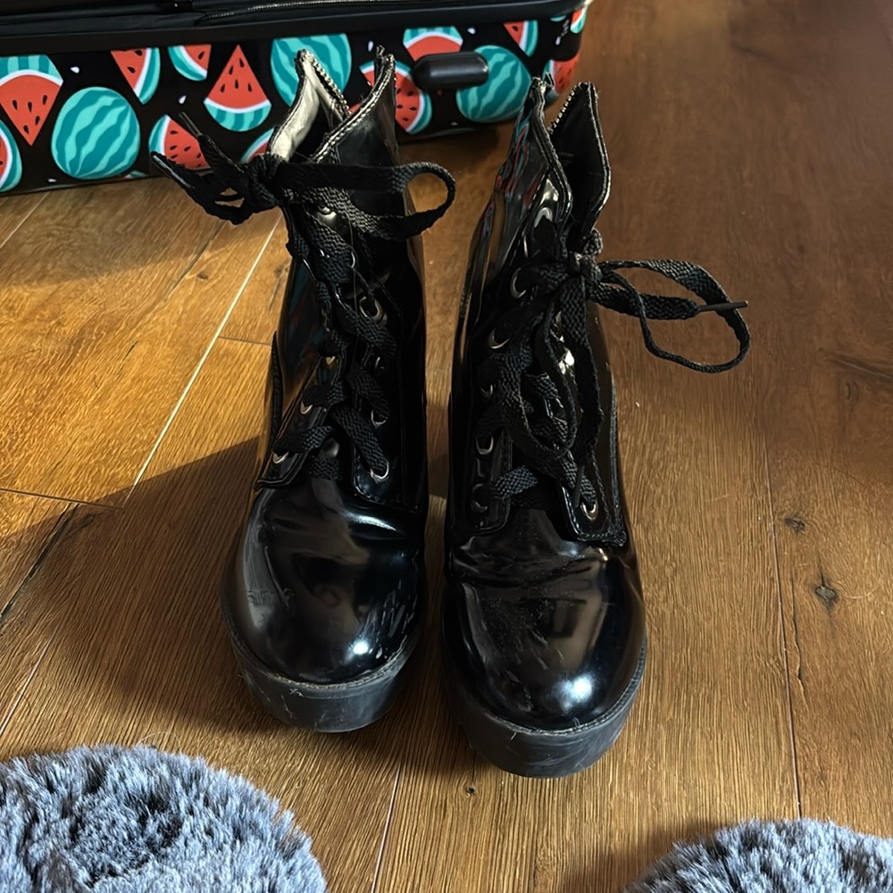 Black ankle high heeled boots